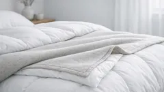 Blanket over doona or under it? The warmest way to layer your bed for Aussie winter nights