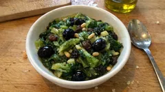 Neapolitan Escarole with Anchovies, Olives, Raisins, and Pine Nuts